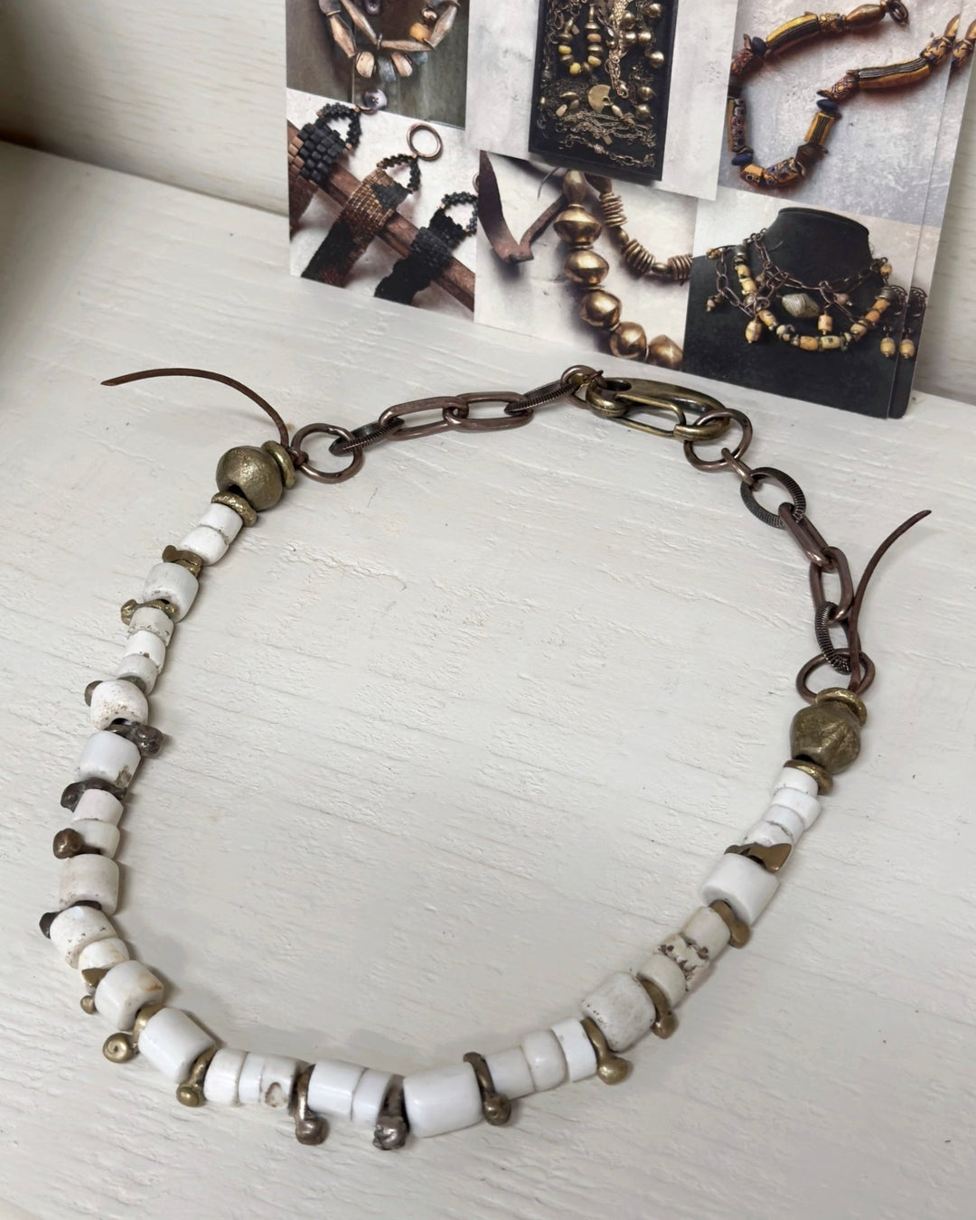 Old bone chips with fulani brass bug beads necklace by US designer Debe Dohrer - La Casa by Importante