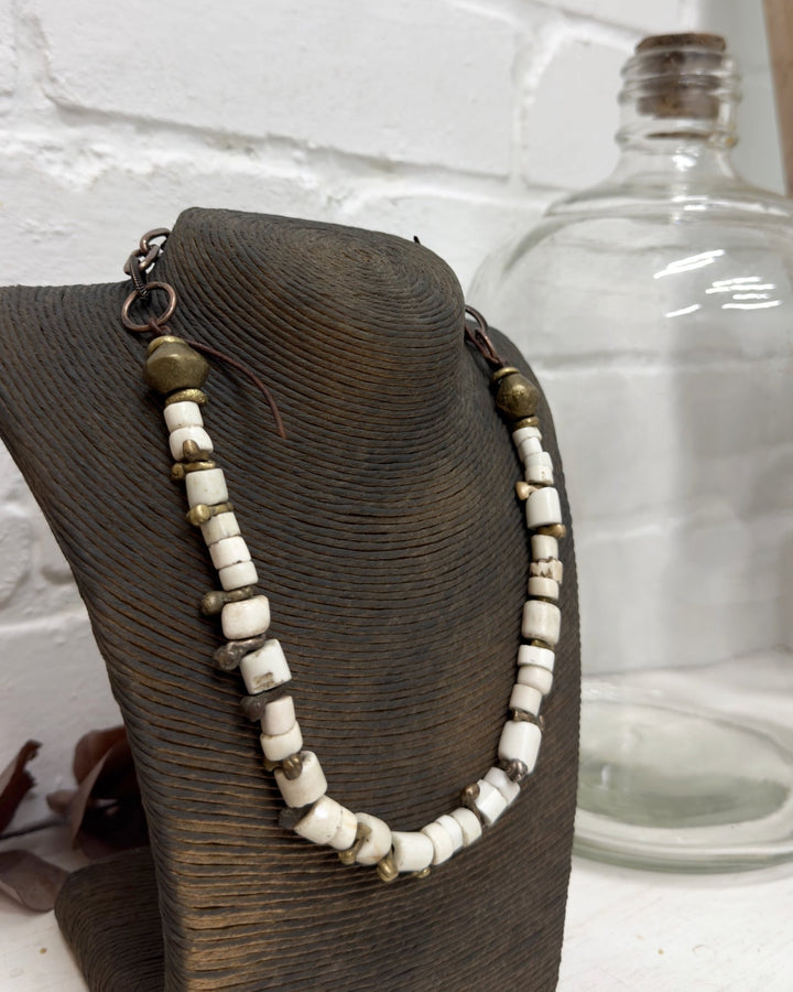 Old bone chips with fulani brass bug beads necklace by US designer Debe Dohrer - La Casa by Importante