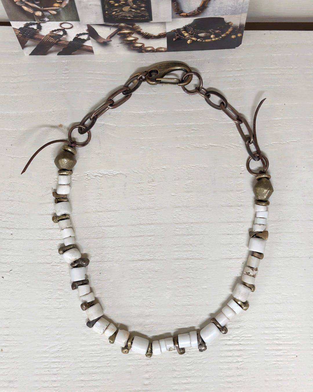 Old bone chips with fulani brass bug beads necklace by US designer Debe Dohrer - La Casa by Importante